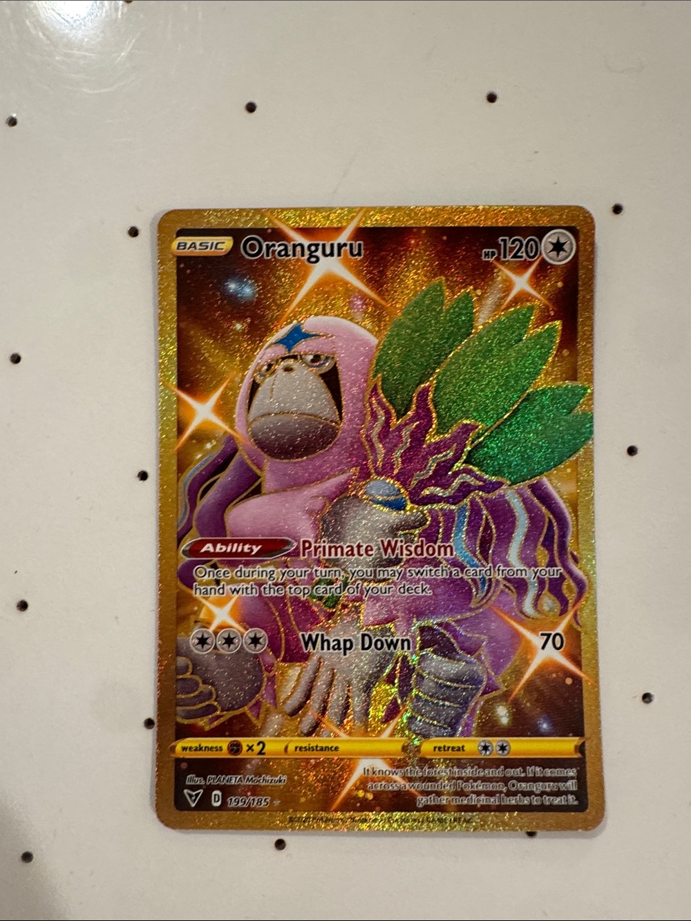 Pokémon Oranguru Holofoil Card - Gold, Purple & Green